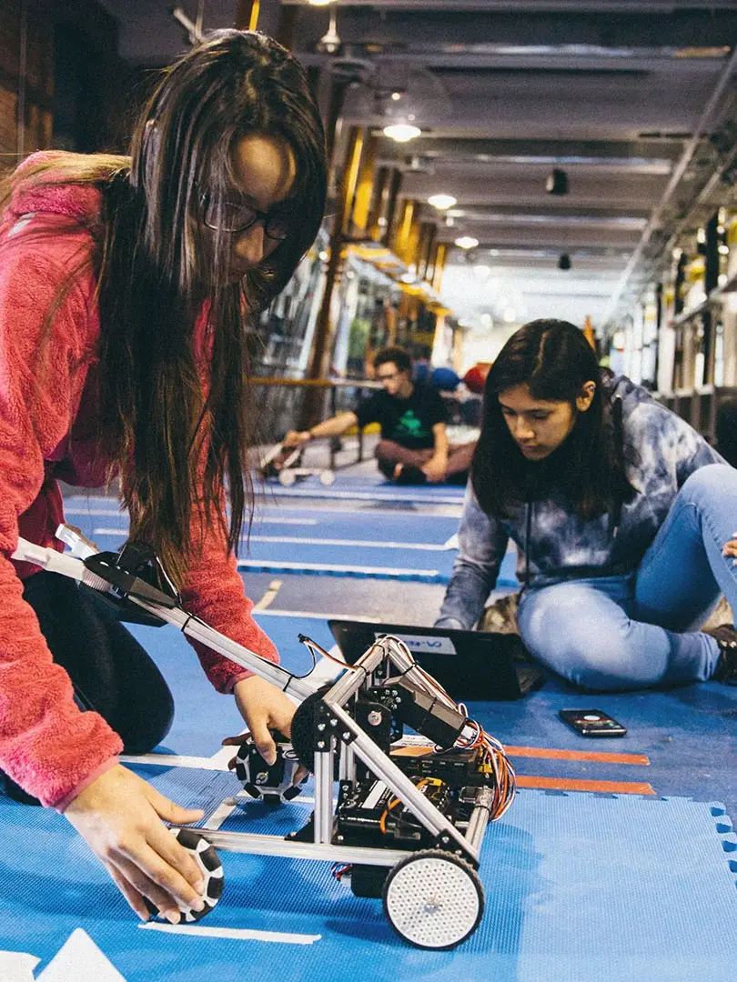 students doing robotics on stem tour