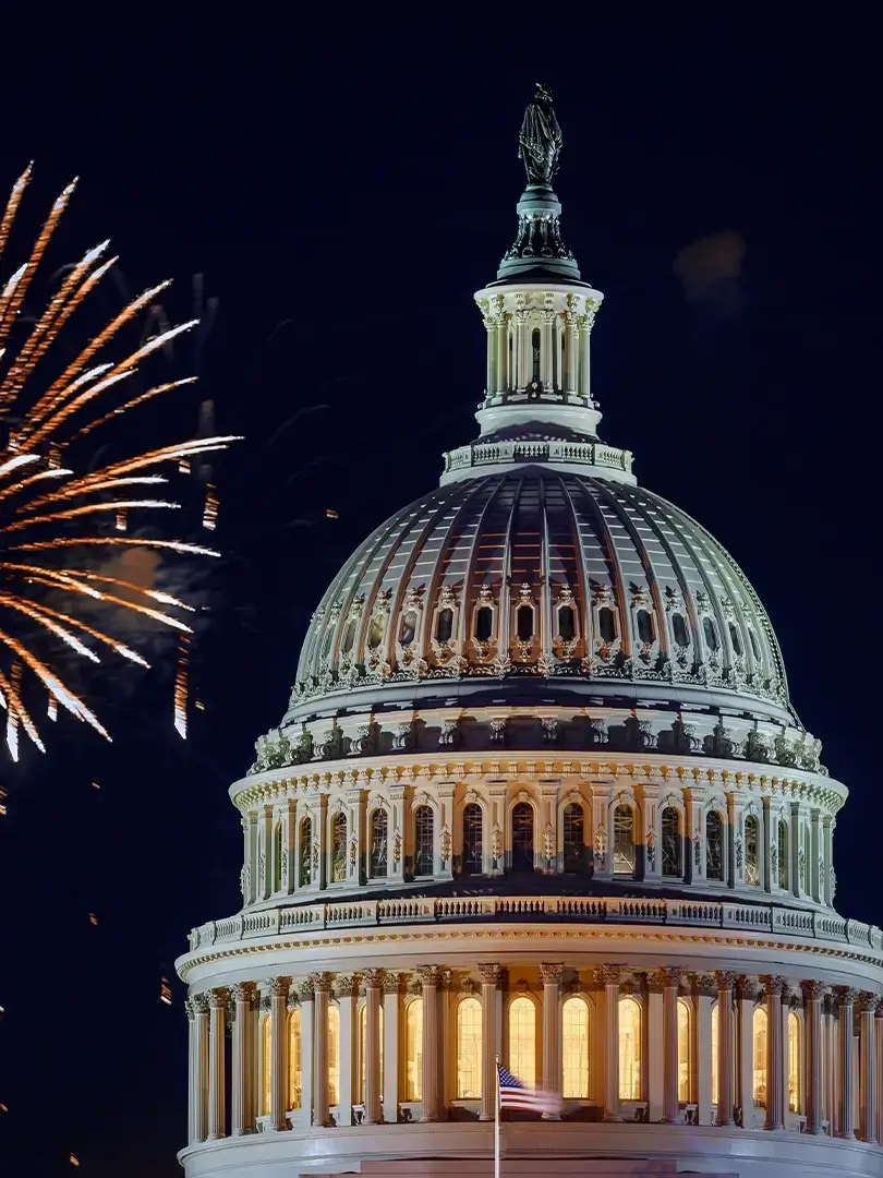 view of the capitol building with fireworks