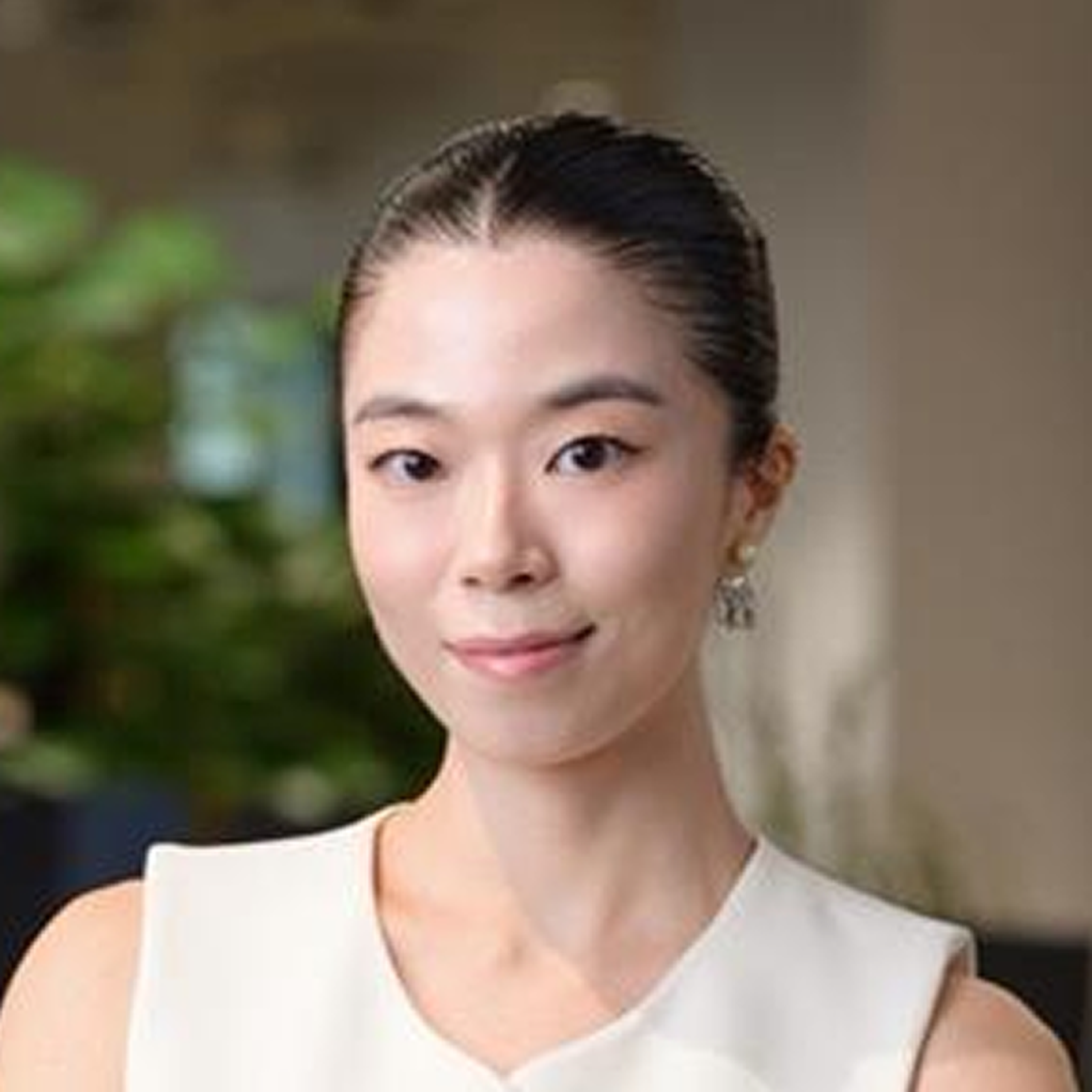 A woman with dark hair tied back