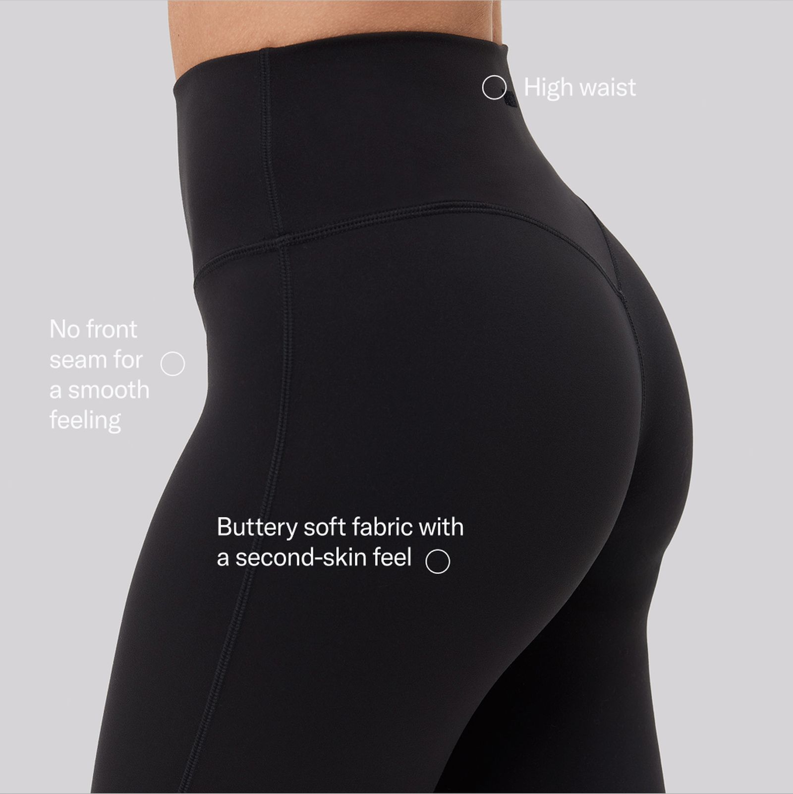 Close-up of black leggings with a high waist, showcasing buttery soft fabric and seamless design for a smooth feel.