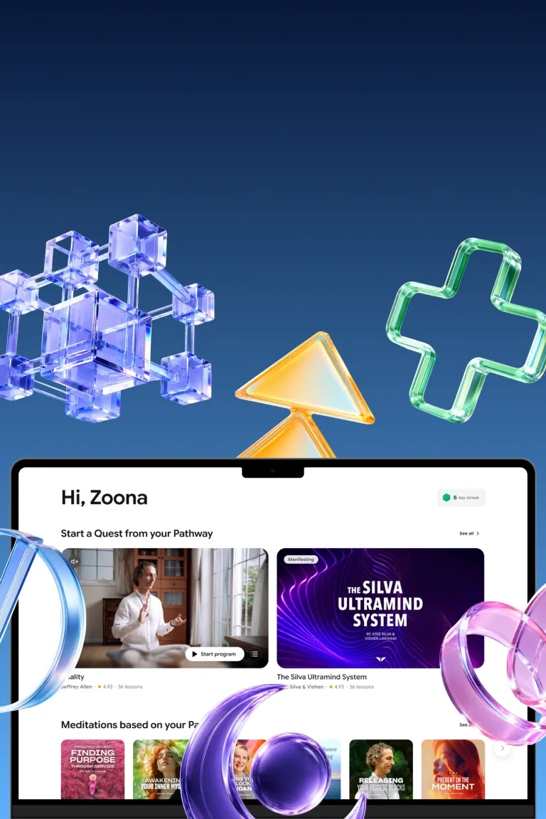 Glass pathway symbols floating above a laptop showing a personalized Mindvalley pathway of quests and meditations