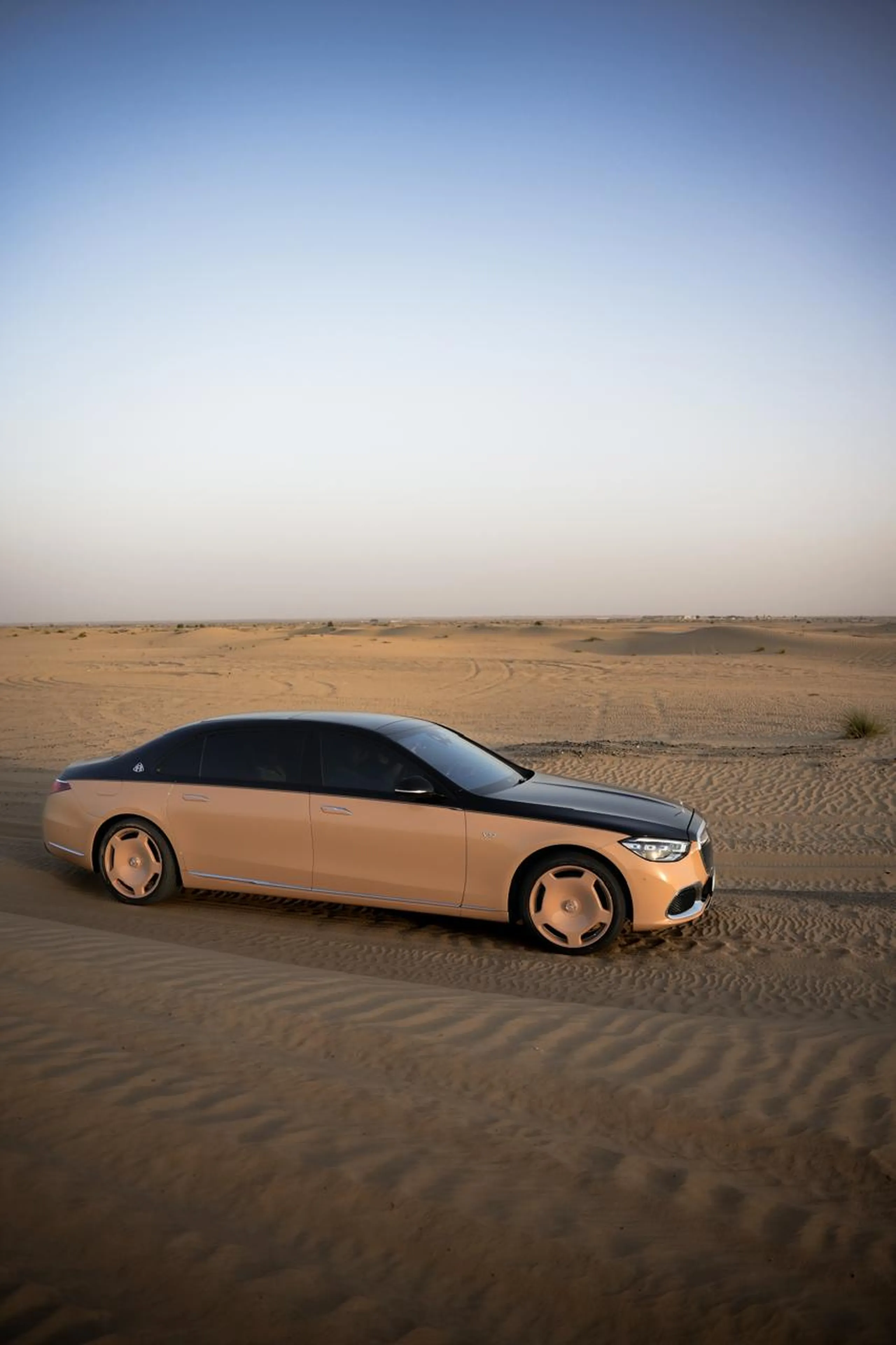 maybach-luxury-sedan-parked-on-desert-sand-near-doha