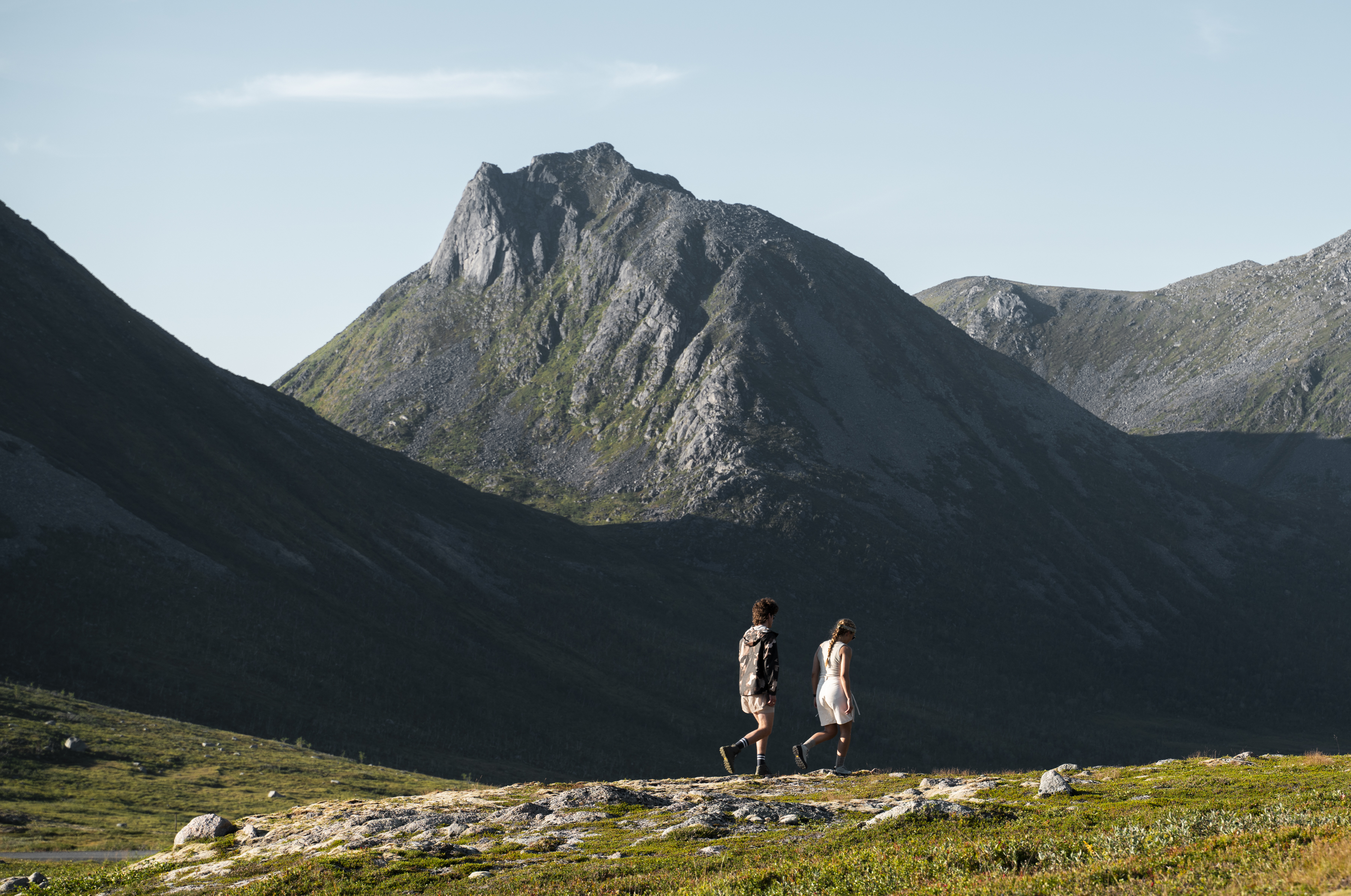 Hiker wearing Alfa walking boots on challenging mountain terrain