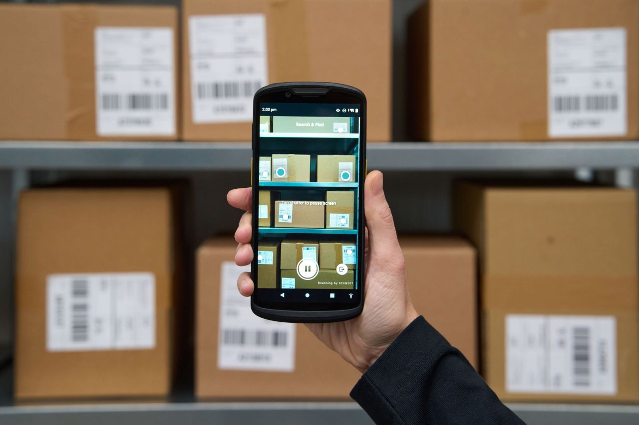 Zebra device screen showing barcodes scanned across multiple shelves, with desired barcodes highlighted using Scandit MatrixScan Find