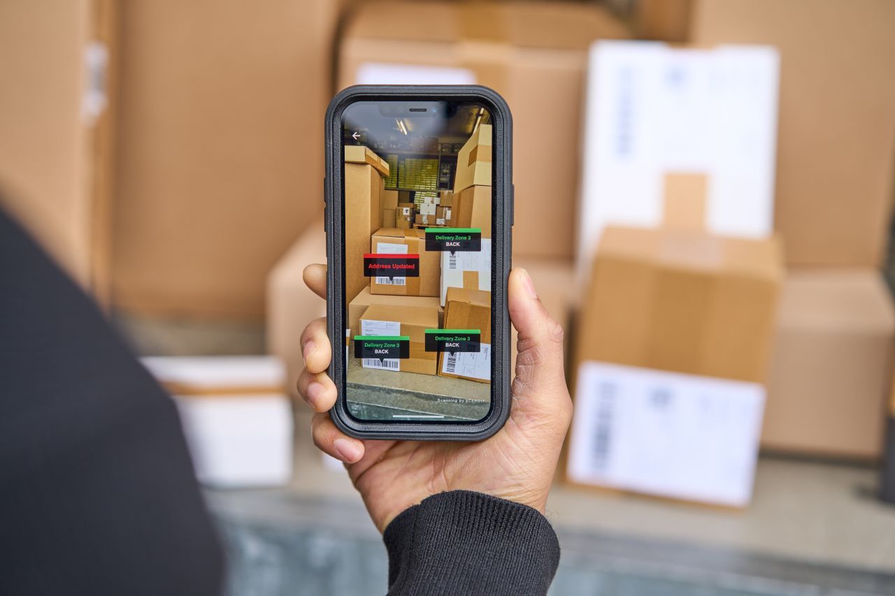 iPhone screen showing augmented reality guidance for scanning multiple barcodes using Scandit MatrixScan AR