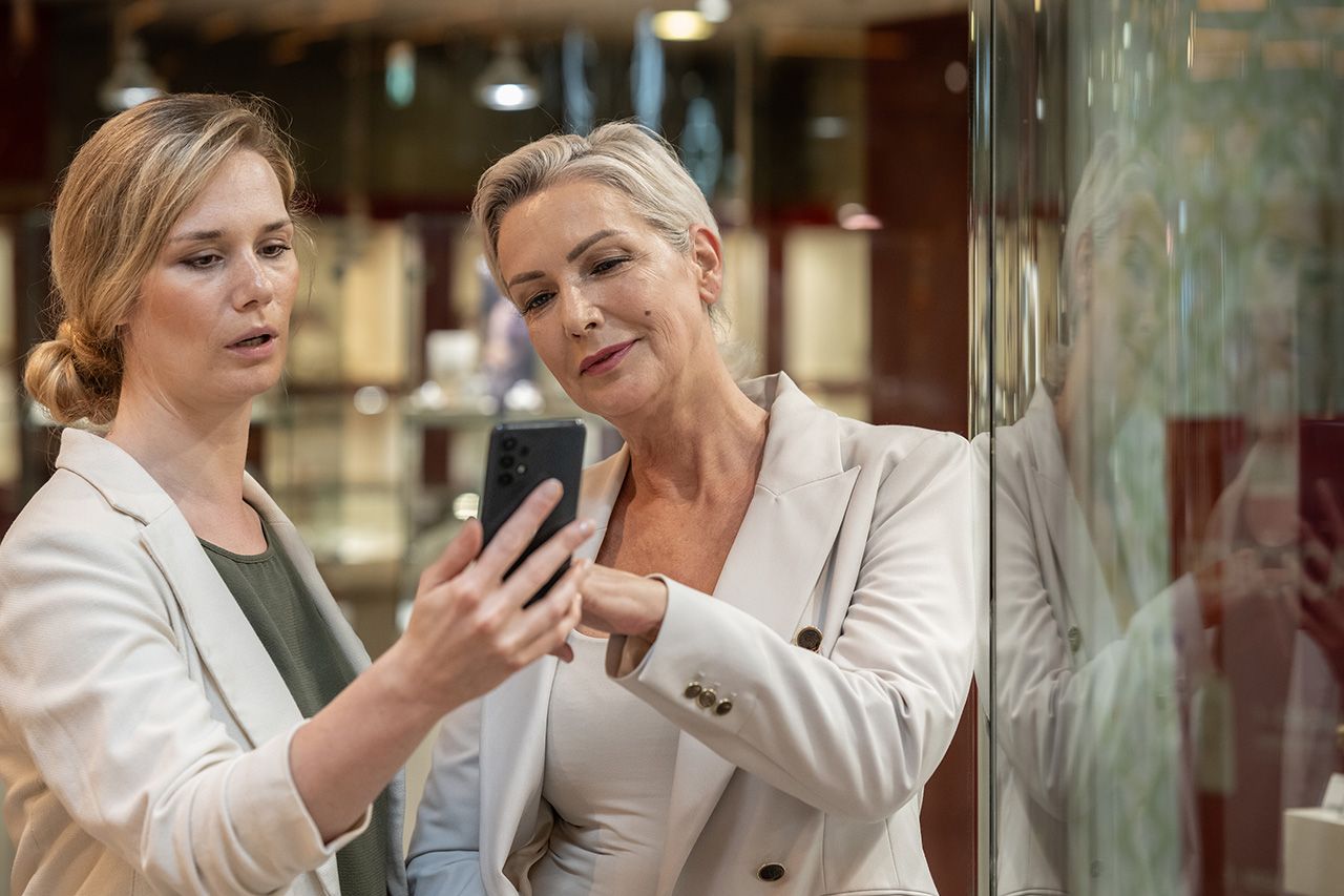 two women mobile phone