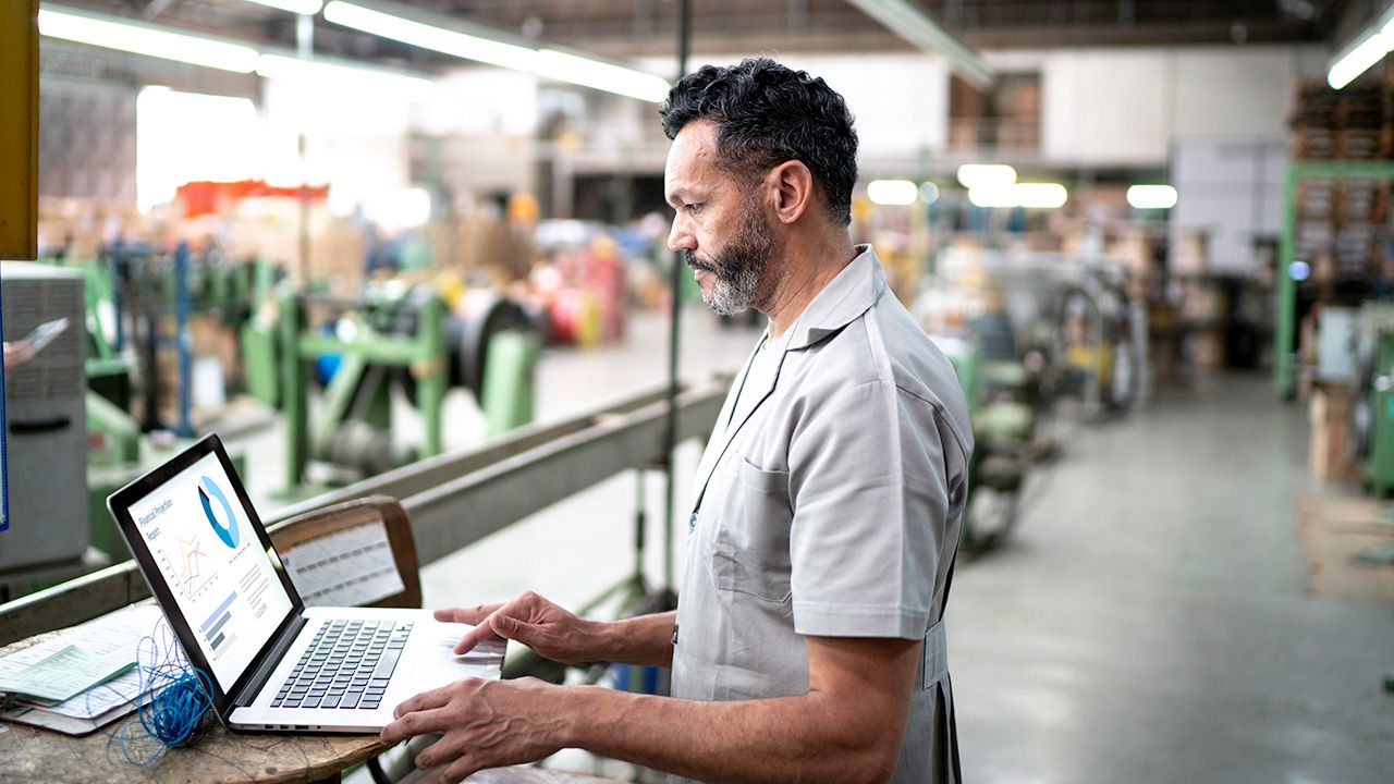 Technician using laptop