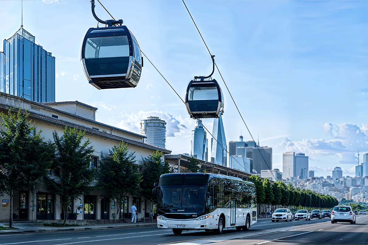Modern cable cars suspended above a busy city street with high-rise buildings, vehicles, and trees – representing innovative urban transportation solutions