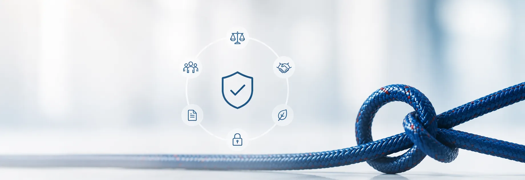 Blue rope tied in a knot on a white surface, surrounded by icons signifying safety, trust, and innovation.