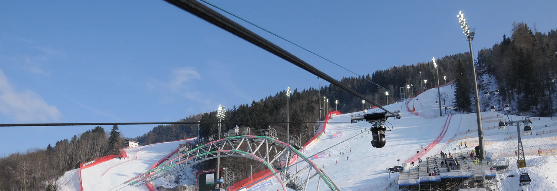 Camera on a rope based moving system filming the finish line and final stretch in Schladming for the popular Nightrace sking race.