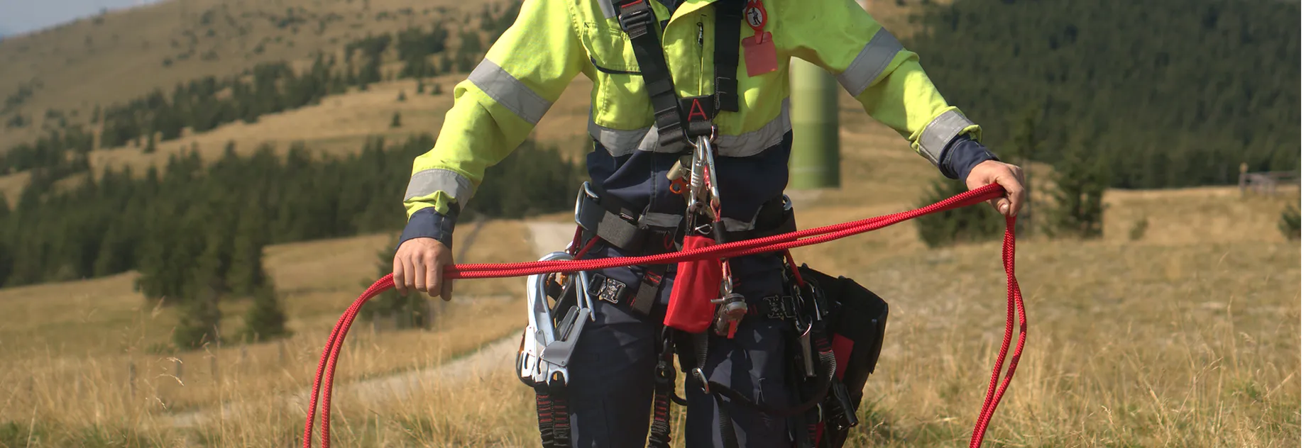 Rope access worker infront of wind mills with Teufelberger rope
