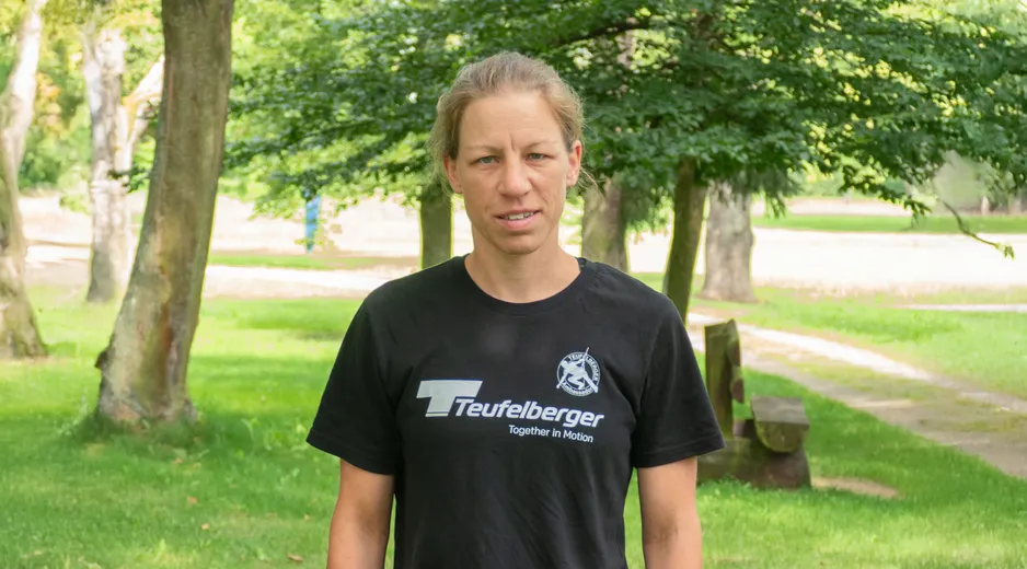 Portrait of our Ambassador Marilou with a forest in the background
