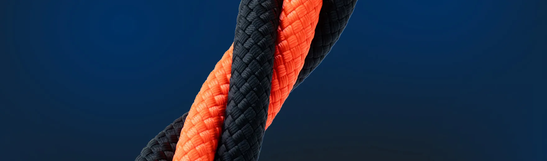Dark Blue background with black and orange rope twisted together