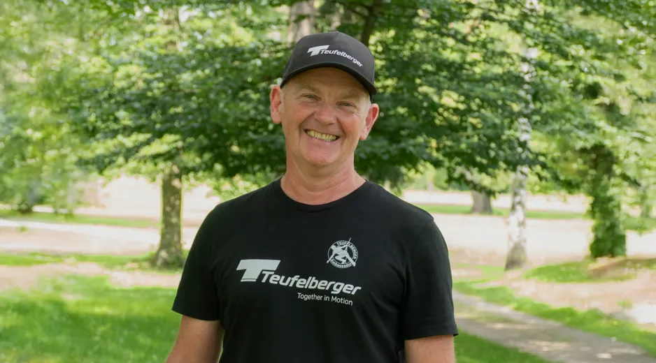 Portrait of our Ambassador John with a forest in the background