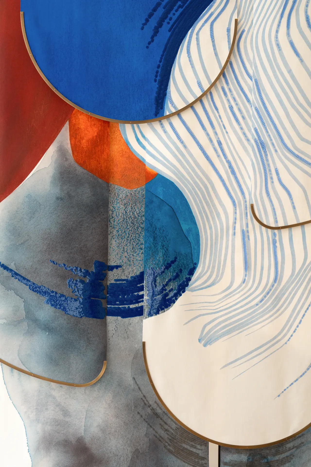 Abstract artwork with bold blue, red, and orange shapes overlaid with curved, wavy lines on a textured background.