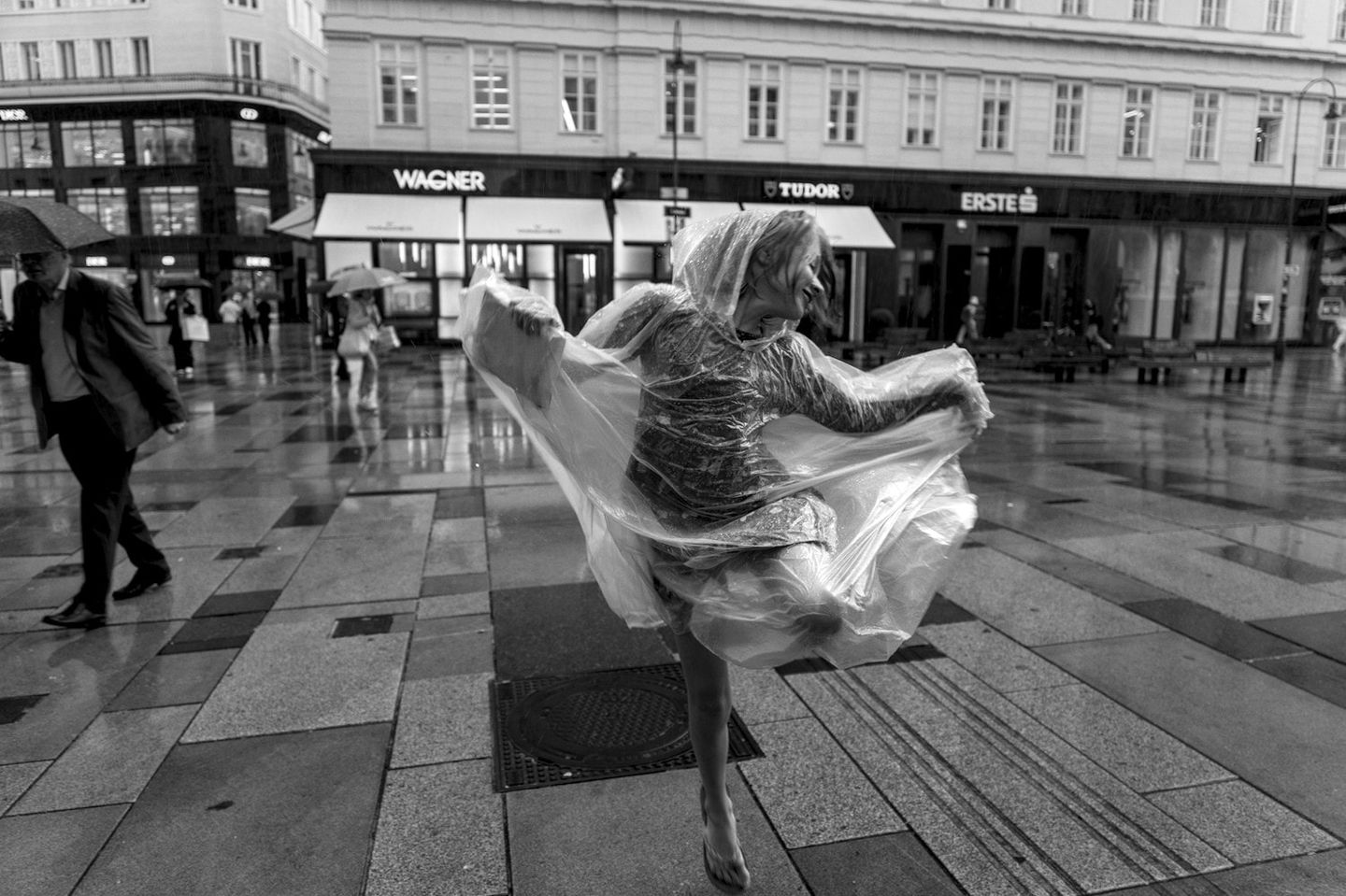 A photo of a young girl dancing on the Vienna streets