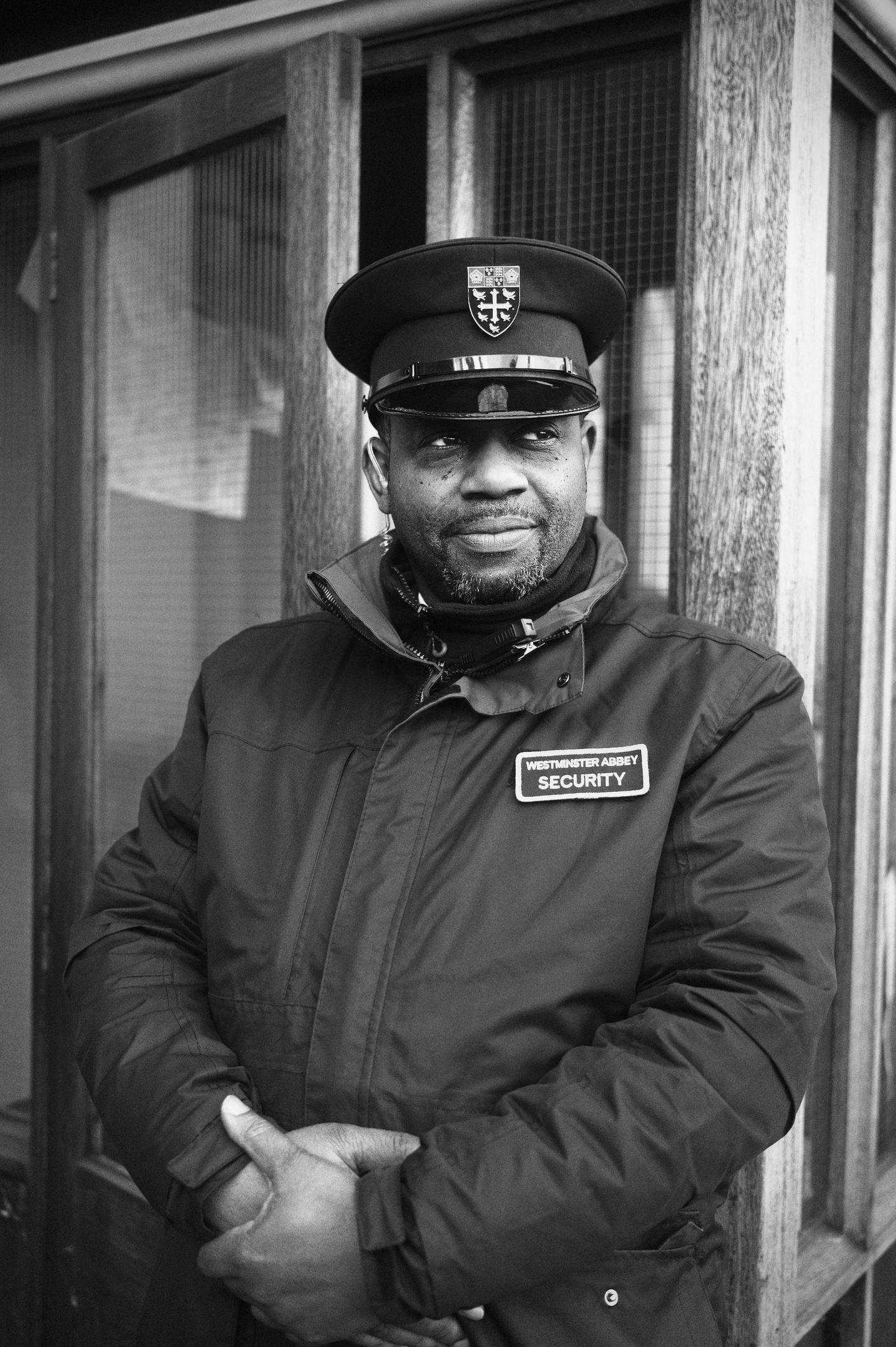 A photo of a guard standing watch by Dean's Yard in London