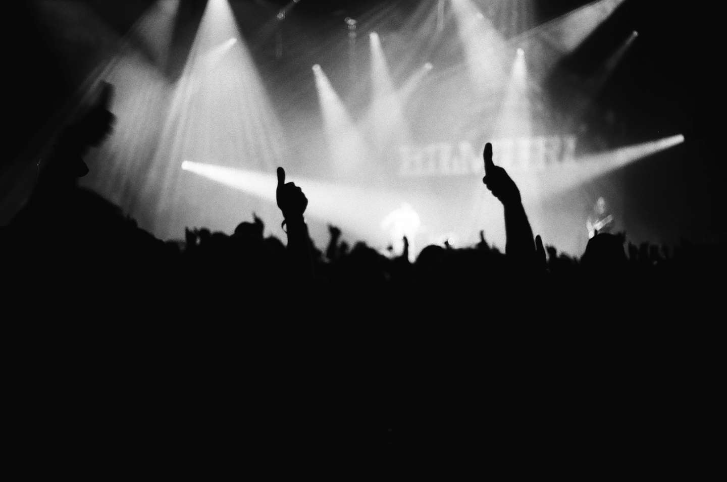 Fans give a thumbs-up to the band Bilmuri, shot on film.