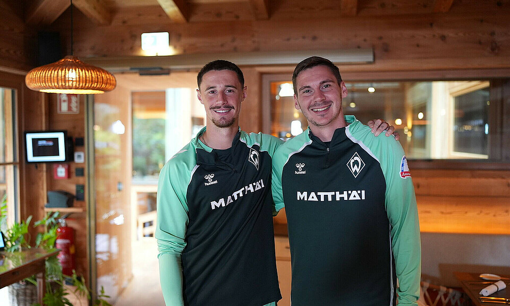 Friedl und Wöber lächeln in die Kamera