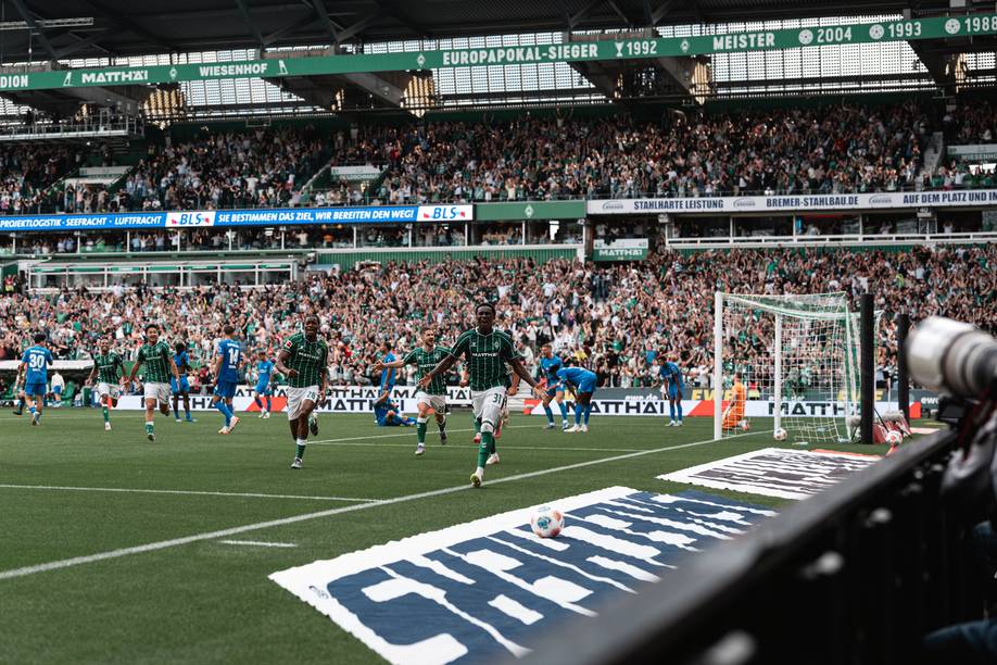 Karim Coulibaly celebrates after scoring against Leverkusen at the Weserstadion.
