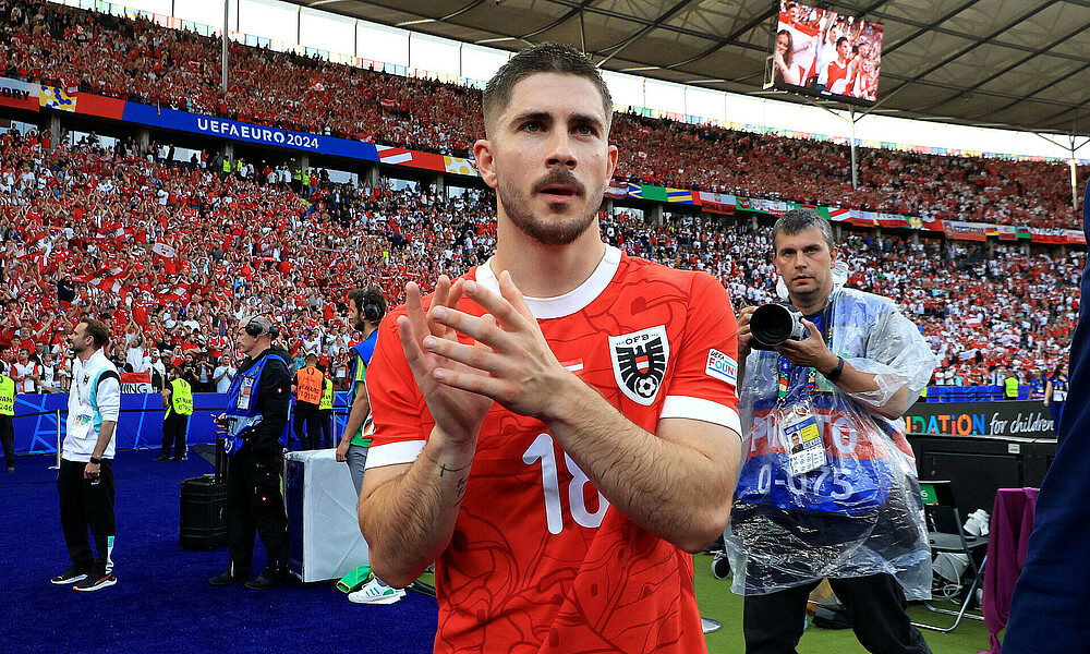 Romano Schmid bejubelt den Sieg bei der EM 2024 mit Österreich gegen Polen
