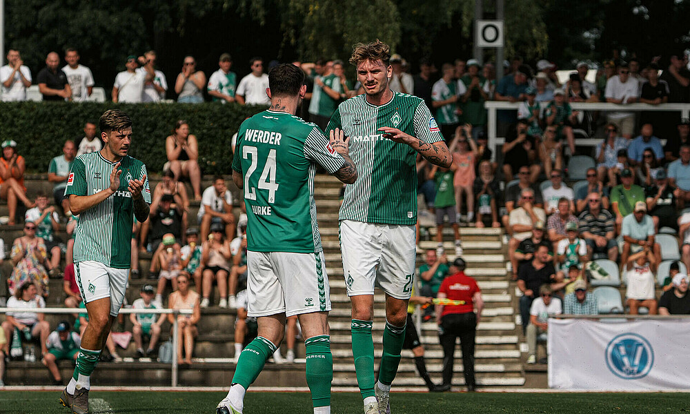 null Woltemade und Burke klatschen sich ab.