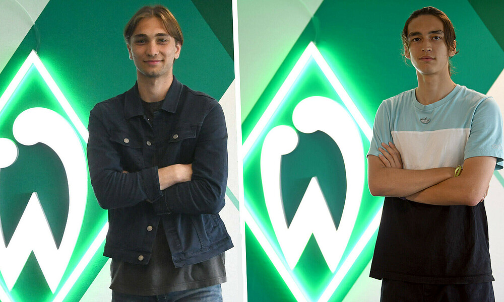 Timur Pazhigov und Yuri Backhaus vor einer Werder-Raute