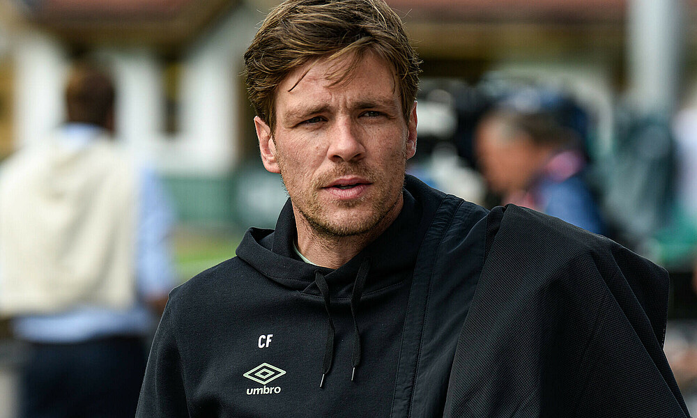 Clemens Fritz in schwarzem Werder-Outfit