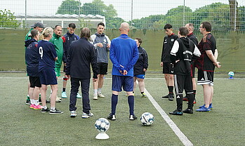 Besprechung der Trainingseinheiten mit dem Trainer.