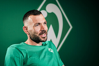 null Markus Kolke im grünen Werder-Shirt.