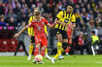 null Joshua Kimmich im Zweikampf mit Jude Bellingham.