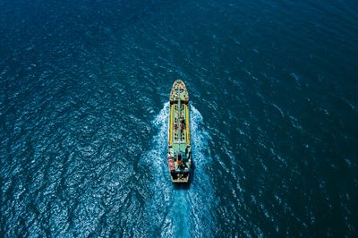 Emerging Markets: Container ship sailing out to sea