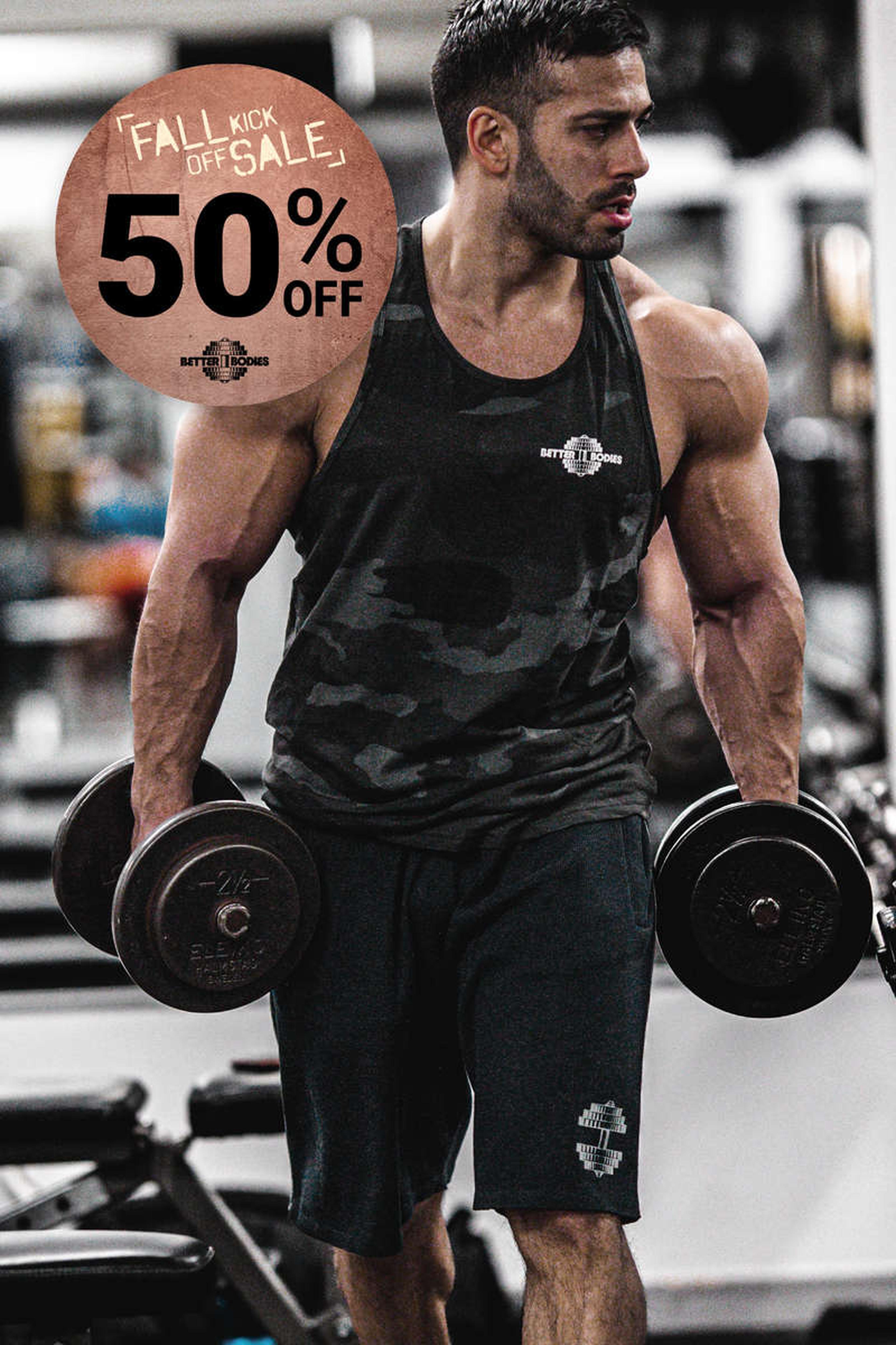 Man in gym attire lifting dumbbells, with a "Fall Kick Off Sale, 50% Off" circular banner in the corner.