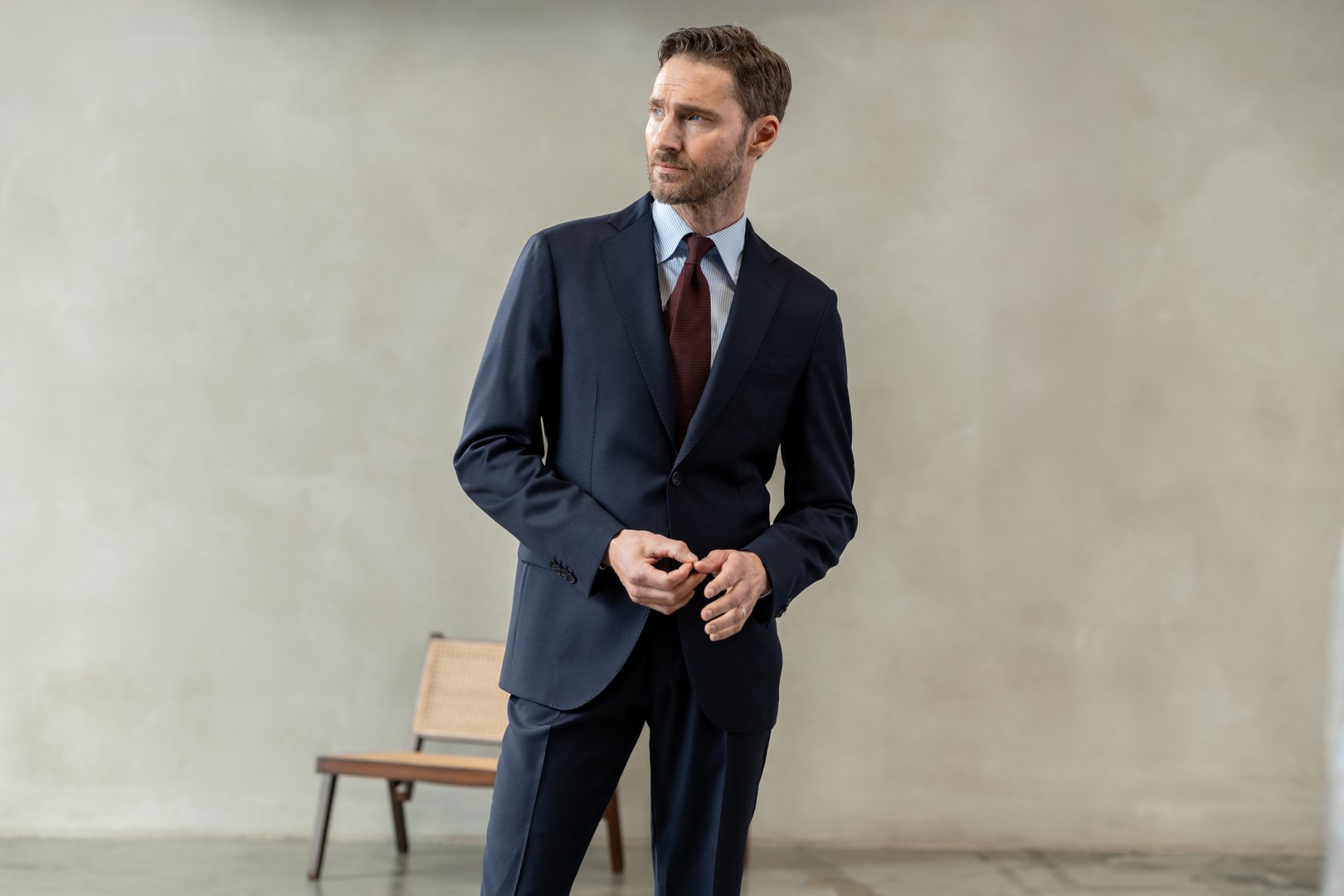 Man wearing navy suit