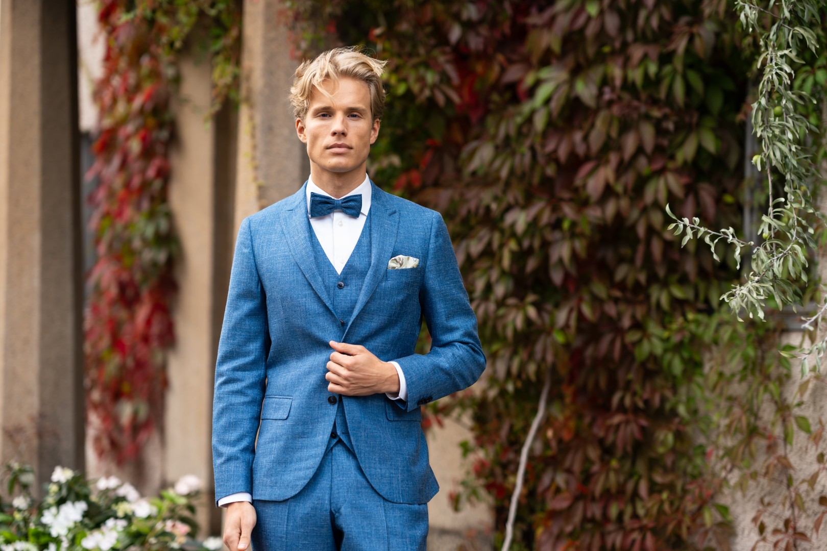 Man wearing blue suits