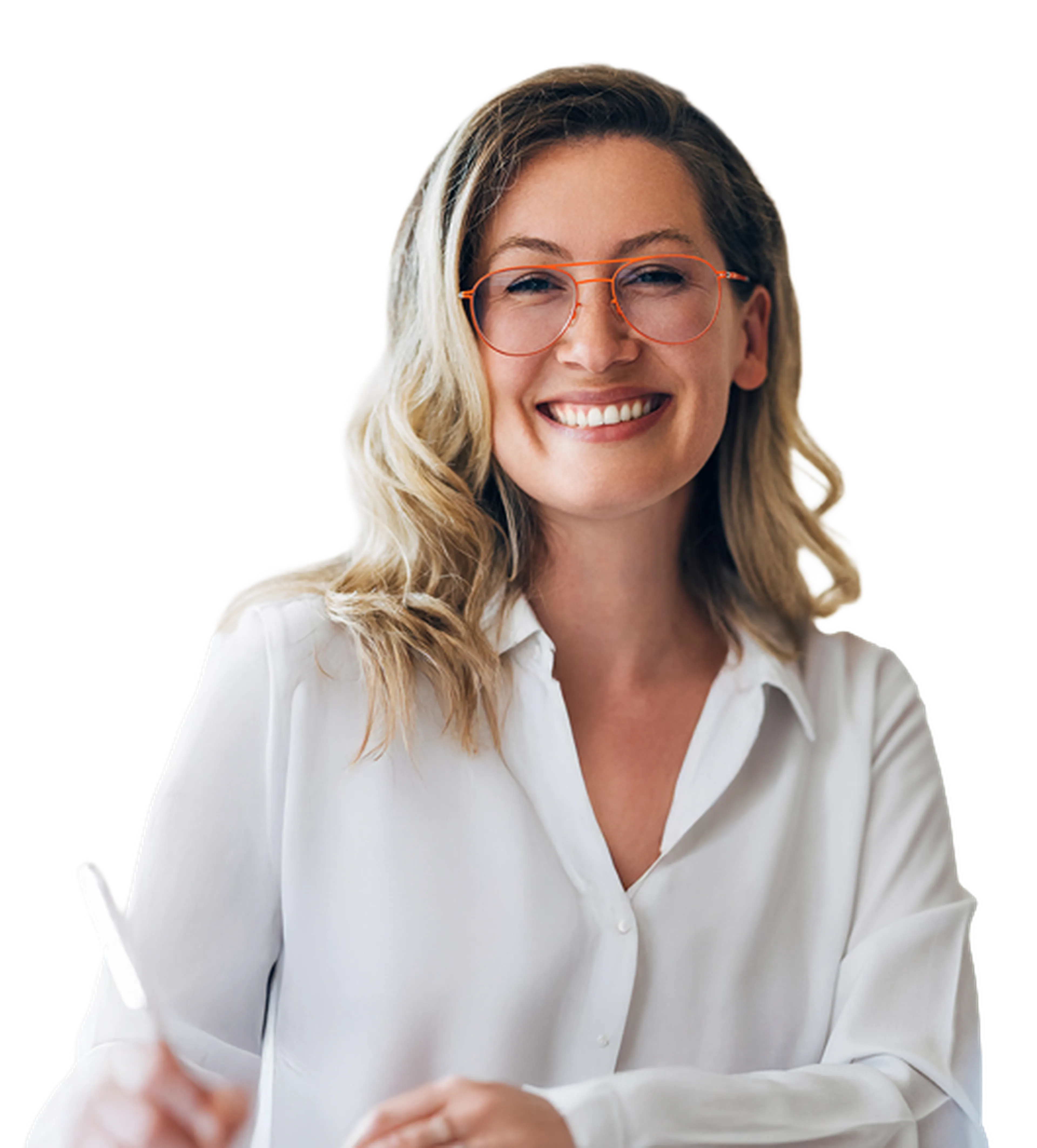 Smiling person with wavy blonde hair and orange glasses, wearing a white shirt, holding a pen