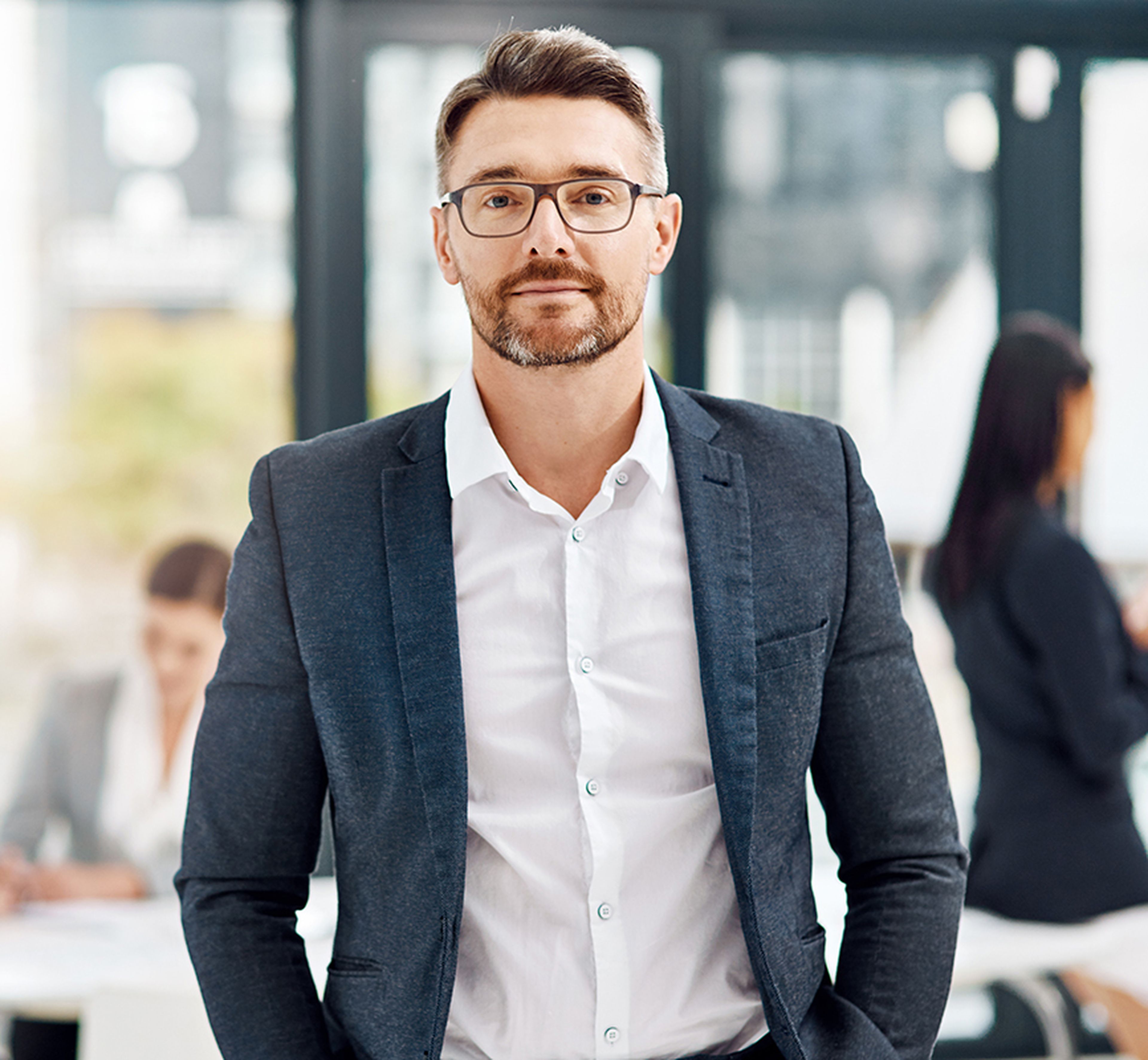Two people in a business meeting having a joyful discussion