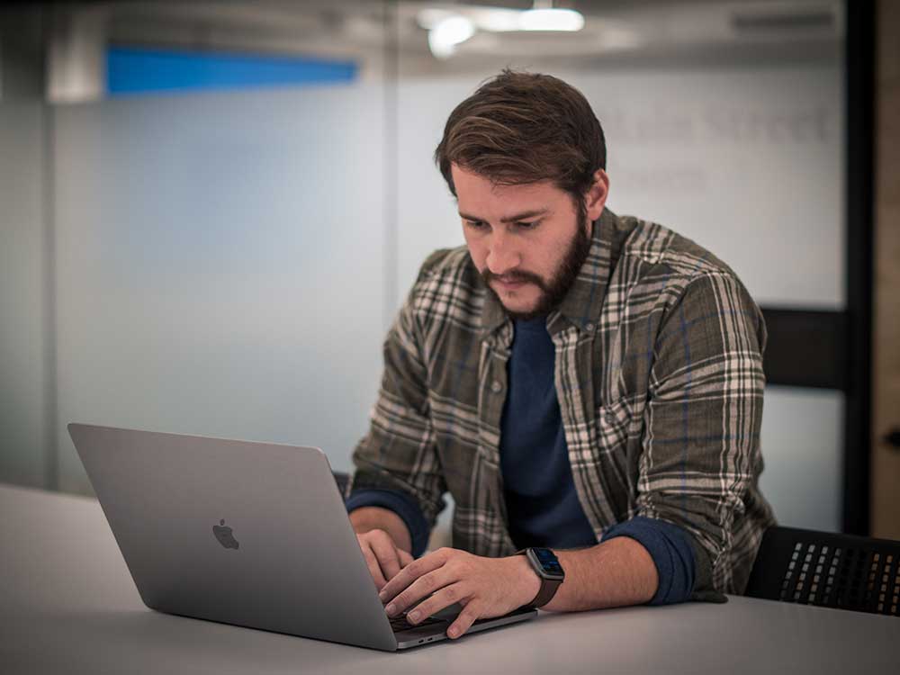 paxton-on-laptop-bamboo-moonello