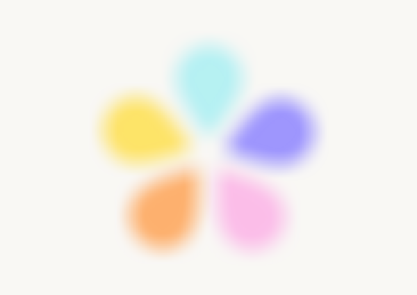 A stylized flower with five colorful, oval petals in light blue, purple, pink, orange, and yellow on a white background.
