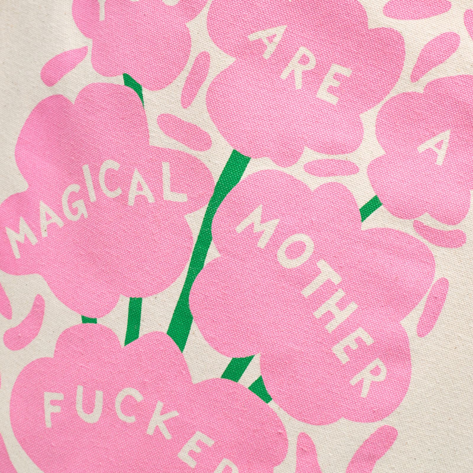 Pink flowers with green stems display the phrase "You Are A Magical Mother Fucker" in white text on a light background.