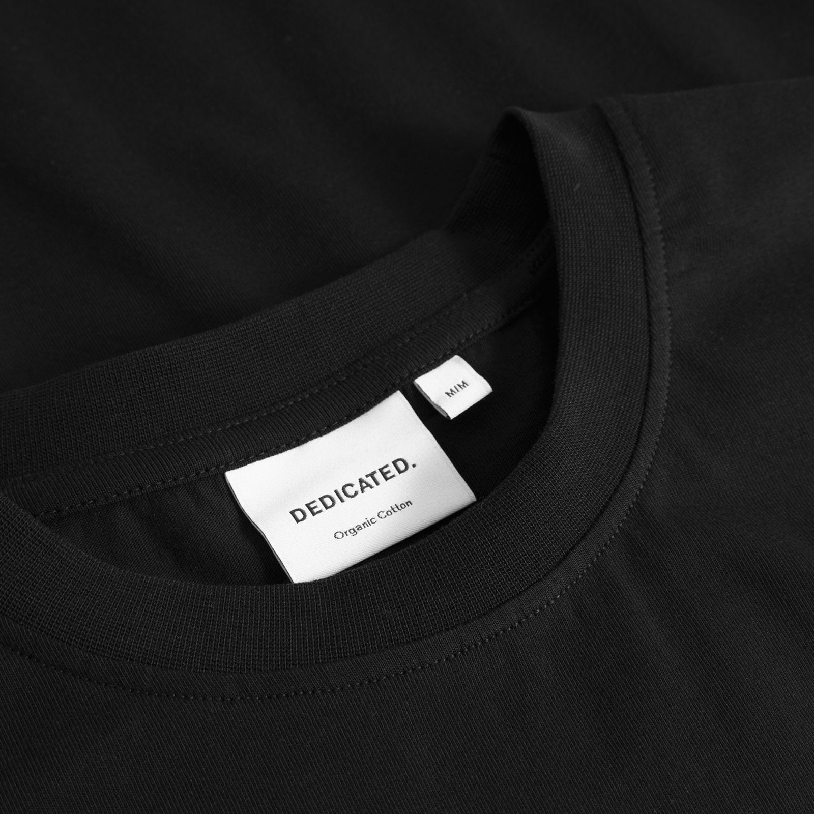 close up black tshirt neck label