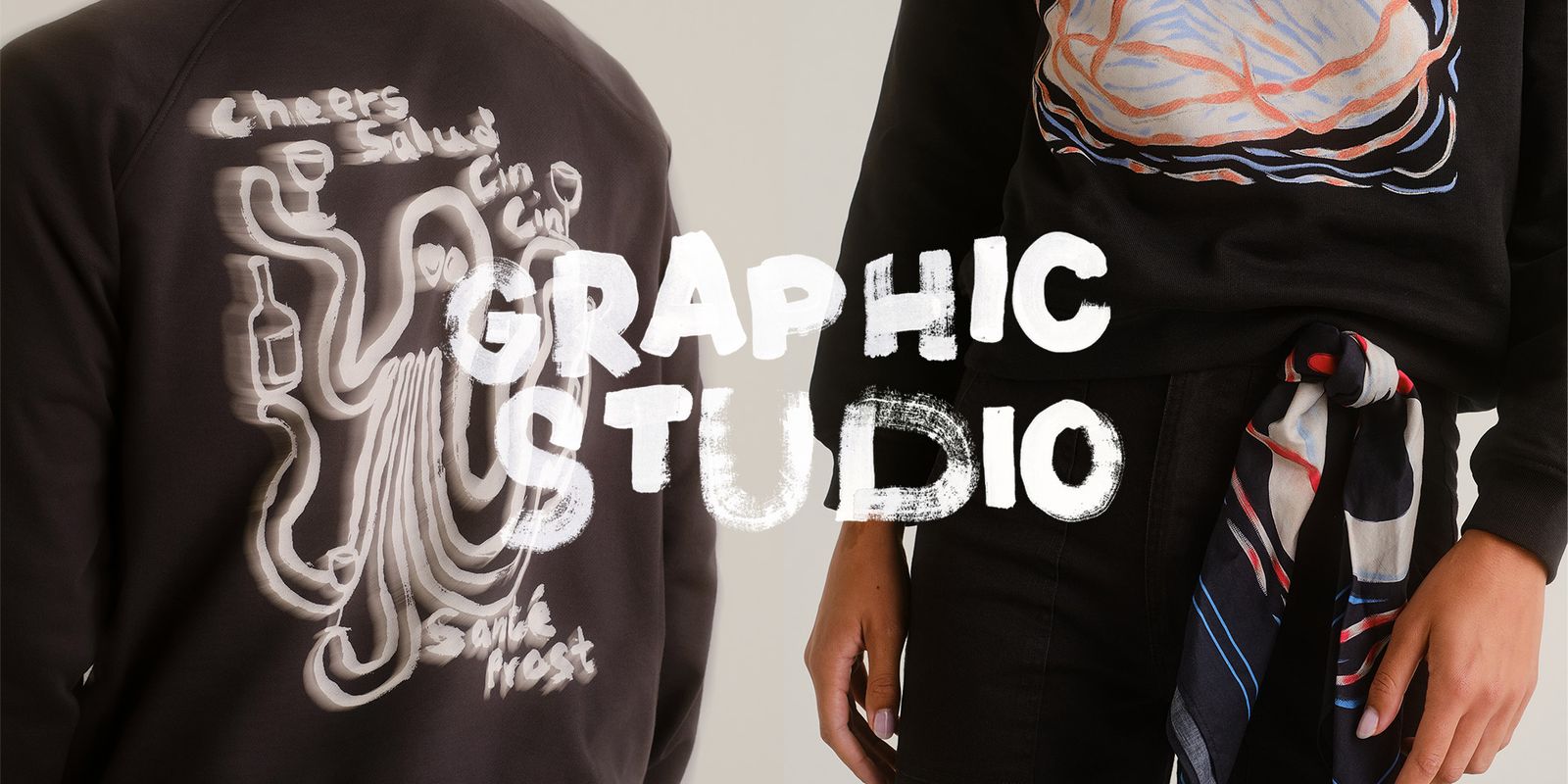 Two people wearing graphic sweatshirts; one with an octopus holding drinks, the other with a colorful abstract design, and text "GRAPHIC STUDIO."