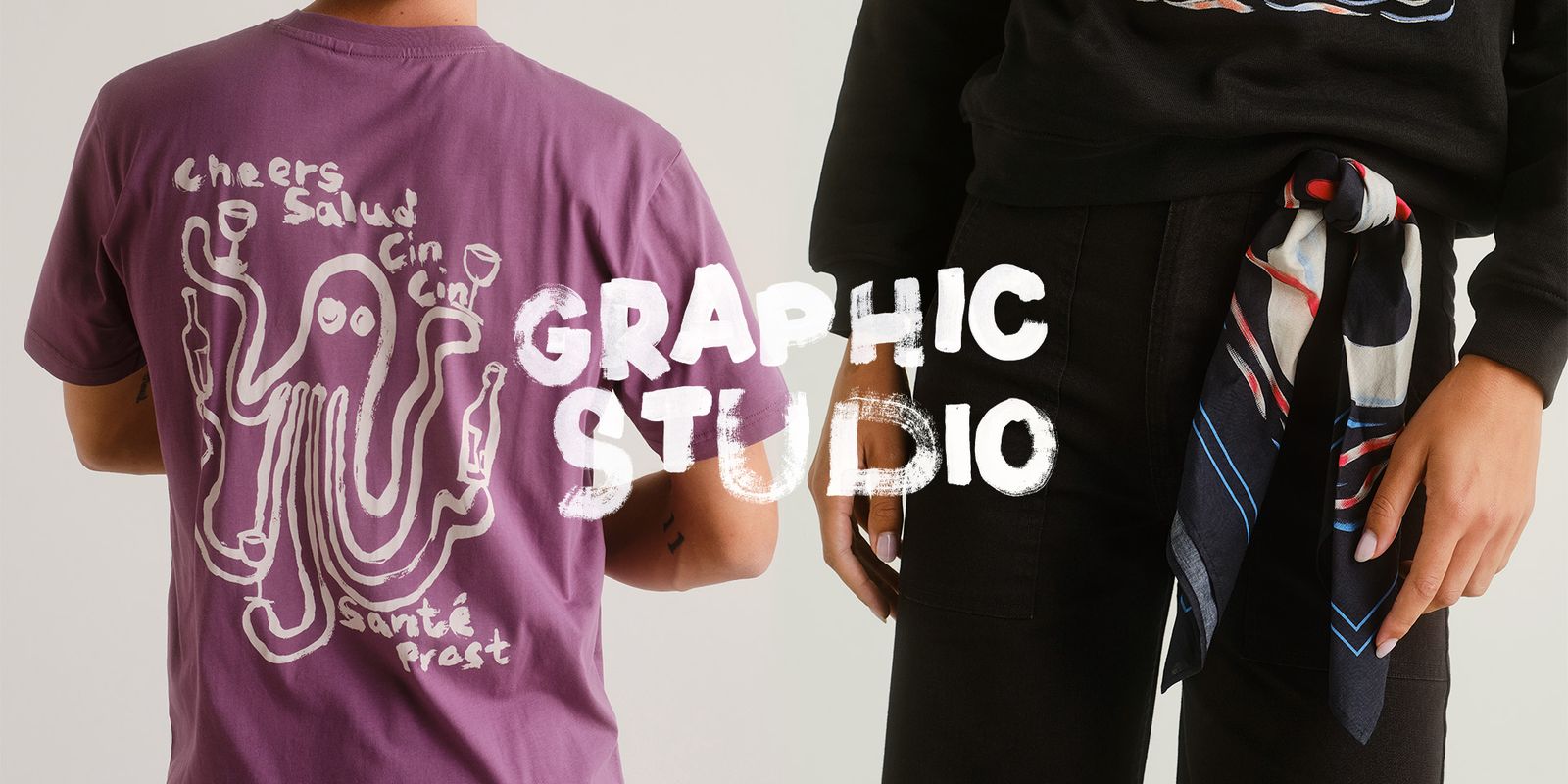 Two people in casual clothes; one wears a purple shirt with an octopus design, the other in black with a patterned scarf. Text reads "Graphic Studio."