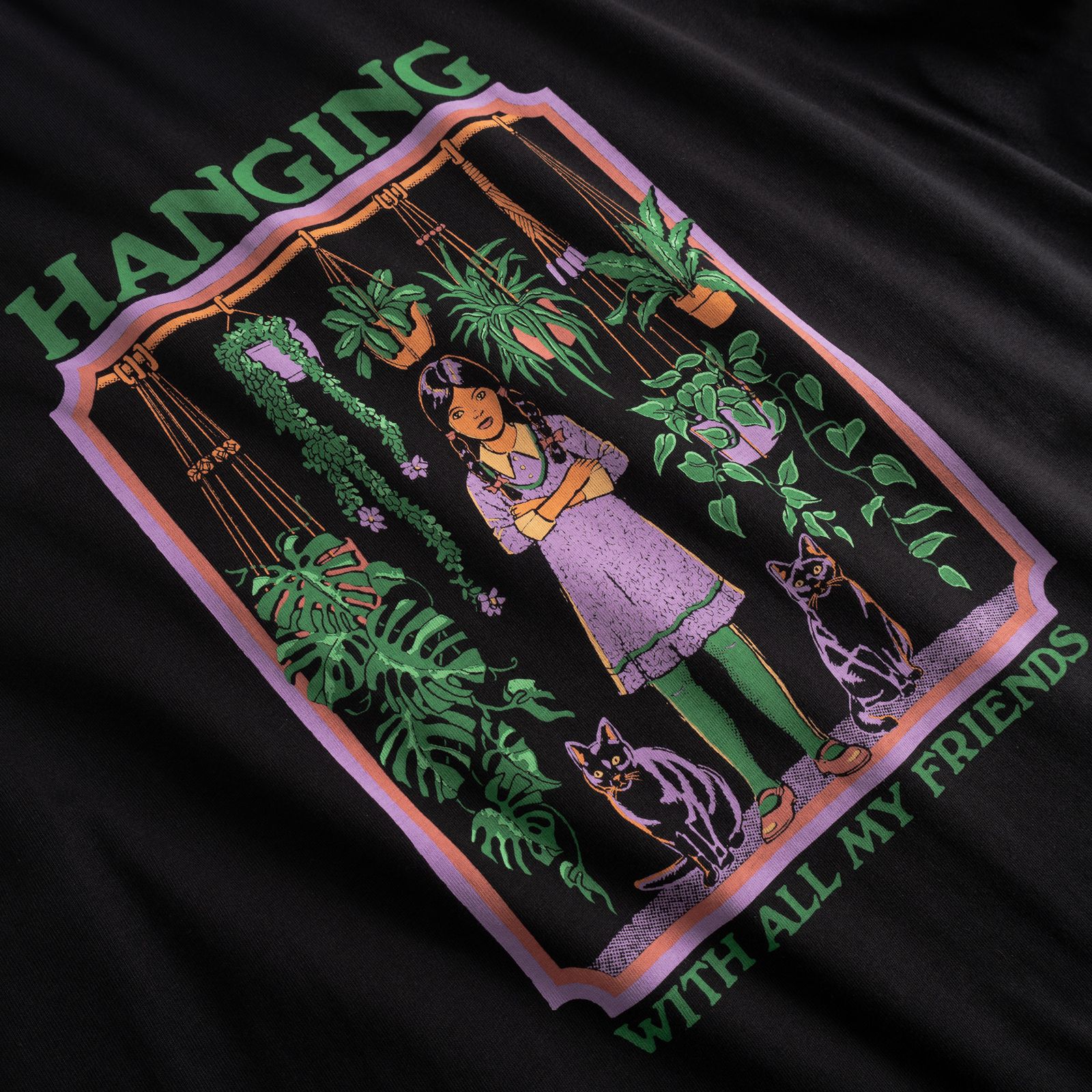 Illustration of a girl with crossed arms, surrounded by hanging plants and two cats, with the text "Hanging with all my friends."