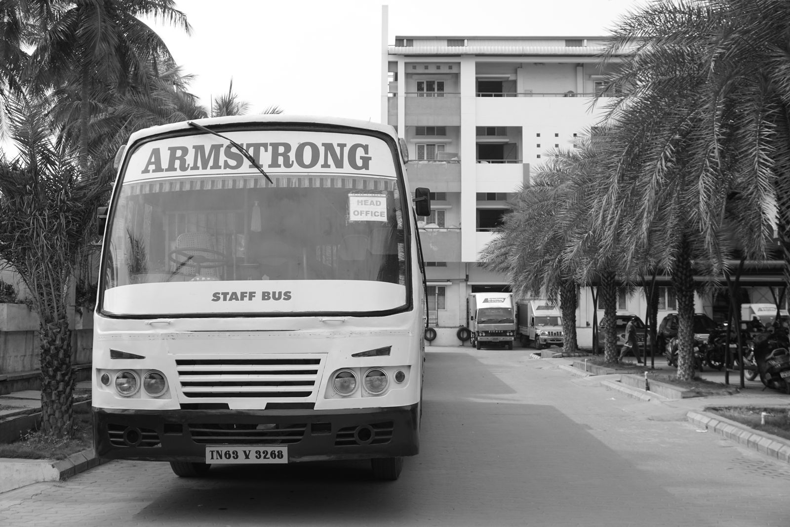 Bus in front of factory Armstrong