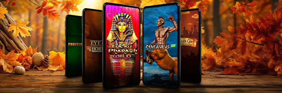 Herbstliches Banner mit fünf Smartphones, die Lucky Pharaoh Wild, Zentaurus Power Spins, Eye of Horus Power Spins, Fruitinator Power Spins und Jolly’s Cap Power Spins zeigen.