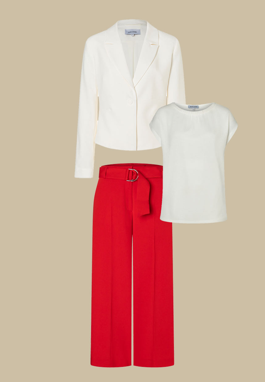 weißer Blazer und rote Culotte