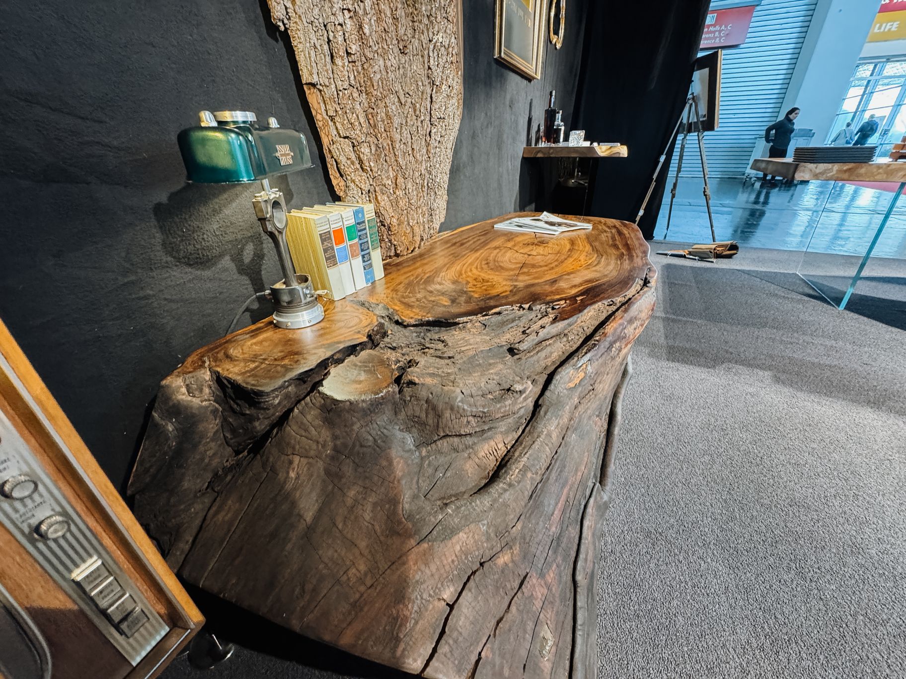 Solid side table made from a walnut trunk by Stammdesign