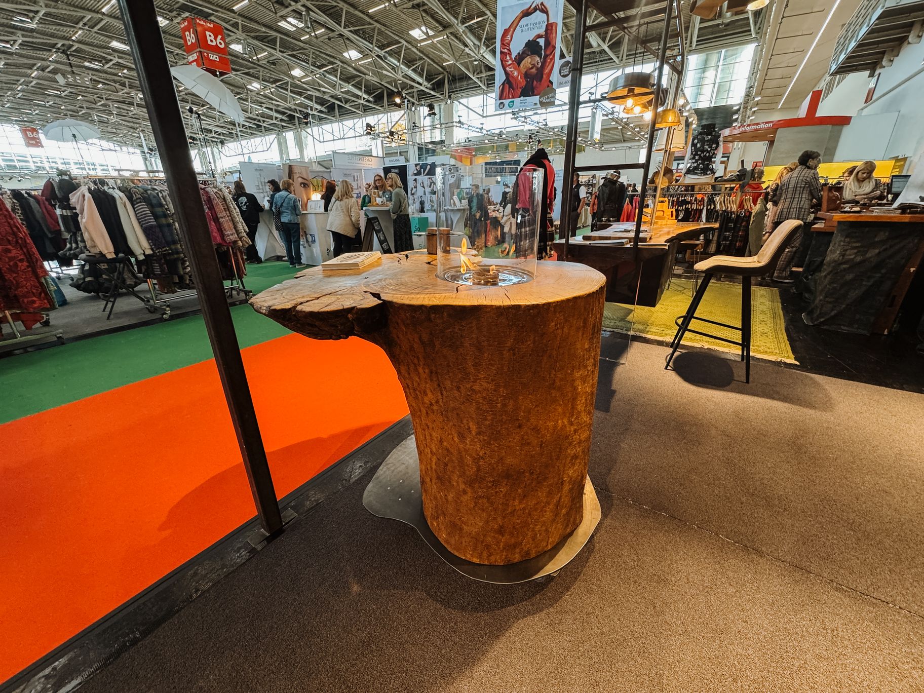 Solid ash standing table with distinctive live edge and built-in fire section