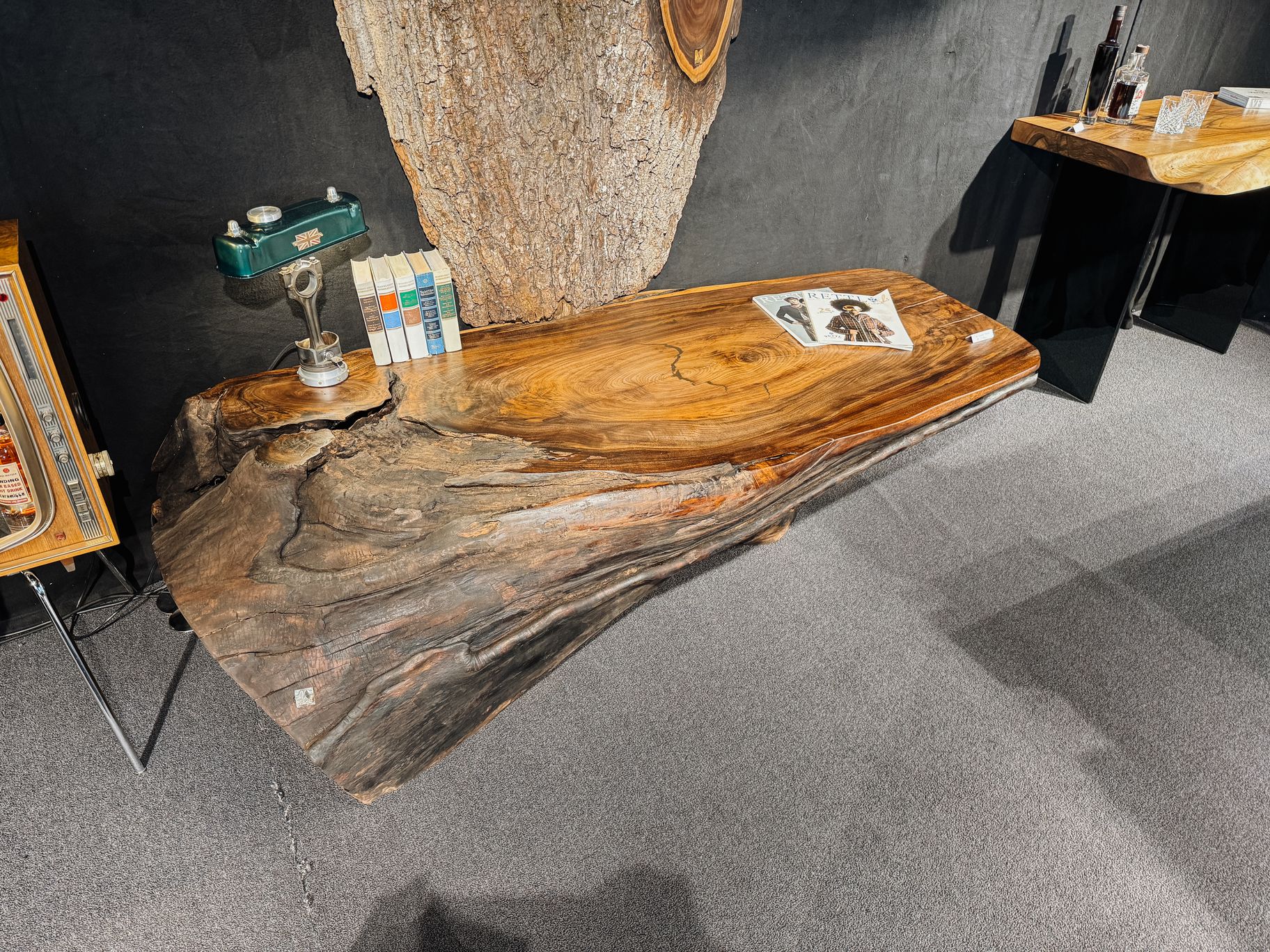 Side table made from a whole walnut trunk with natural live edge and distinctive grain
